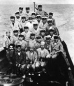 Crew of Japanese submarine I-29 posing with Subhash Chandra Bose shortly before Bose disembarked at Sabang, Sumatra, occupied Dutch East Indies, 6 May 1943