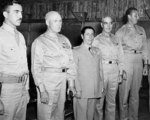 US Major Hoover, US Lieutenant General George Brett, Ecuadorian Defense Minister General Alberto Romero, unidentified officer, and US Lieutenant Colonel Lucius Drafts at the Galápagos Islands, 9 Dec 1943
