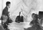 Chiang Kaishek at a military planning session, China, circa 1938-1940; note He Yingqin to Chiang
