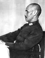 Chiang Kaishek seated at a table, circa 1940