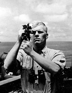 Navigation officer Gerald R. Ford taking a sextant reading aboard USS Monterey, 1944