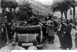 Wilhelm Frick, in a convertible, waving to the crowd, Sudetenland, Czechoslovakia, 23 Sep 1938, photo 2 of 2