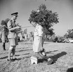 King George VI of the United Kingdom knighting Oliver Leese in the field, Italy, 26 Jul 1944