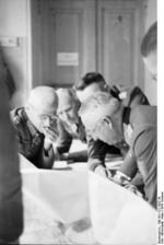 German Army Colonel General Hermann Hoth and Field Marshal Erich von Manstein studying a map during the Battle of Kursk, Russia, Jul 1943