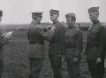 Douglas MacArthur being decorated in the field during WW1, circa 1918, photo 1 of 2
