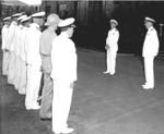 Admiral Chester Nimitz addressing officers immediately after assuming command of Pacific Fleet, Pearl Harbor, US Territory of Hawaii, 31 Dec 1941; Admiral Husband Kimmel at right