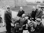 US President Franklin Roosevelt greeting UK Foreign Secretary Anthony Eden during the Quebec Conference, Canada, Aug 1943; King behind them and Churchill seated near Roosevelt