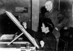 Chiang Kaishek observing Song Meiling practicing calligraphy, circa 1930s
