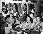 Pilots of US Navy Torpedo Squadron 13 in their ready room aboard carrier Franklin just before the Battle of the Sibuyan Sea, 24 Oct 1944; squadron command Lieutenant Commander Larry French seen second