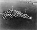 Holland with submarines Cachalot, Dolphin, Barracuda, Bass, Bonita, Nautilus, and Narwhal, 24 Dec 1934