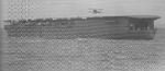 A biplane landing on carrier Hosho, East China Sea, 1932