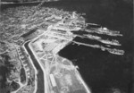 Aerial view of Puget Sound Naval Shipyard, Bremerton, Washington, United States with the Manette Bridge over the Port Washington Narrows in the background, 1932.