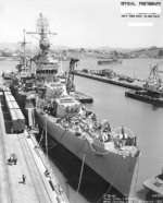 Minneapolis at Mare Island Navy Yard, California, US upon completion of overhaul and repairs, 30 Aug 1943; note SK-1 radar and gun directors on foremast and bridge, and fake windows pilothouse