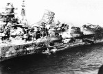 Close-up view of the Mogami-class cruiser Mikuma during the Battle of Midway, showing damage, Jun 1942; photo was taken by a US Navy pilot.
