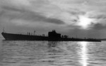 USS Perch silhouetted by the sun, circa 1936-1937