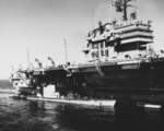 USS Pompon and USS Thornback receiving supplies from USS Saratoga, 17 Aug 1958
