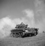 Covenanter tank of British 6th Guards Armoured Brigade emerging from a smokescreen, Codford in Wiltshire, England, United Kingdom, Aug 1942