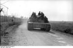 German Army Tiger I heavy tank carrying troops on a road, Italy, Feb 1944