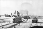 German SdKfz. 251 halftrack vehicles and Panzer IV tanks in Russia, 21 Mar 1944, photo 2 of 2