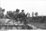 SdKfz. 251 halftrack vehicle with its crew in Northern France, 21 Jun 1944