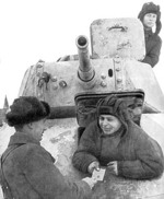 Soviet T-50 light infantry tank and crew, circa 1940s