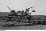 Crew of a 24 cm SK L/40 Theodor Karl railway gun practice loading, southern France, 1941