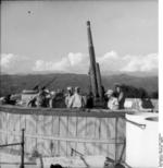9 cm Flak 309/1(i) anti-aircraft gun and its German crew on the coast of the Gulf of La Spezia, Italy, Jul-Aug 1944