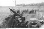 German troops with a 10.5 cm K 35(t) field gun in France, Aug 1941, photo 1 of 2
