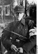 Young German Volkssturm soldier with MP 40 submachine gun in East Prussia, Germany, Oct 1944