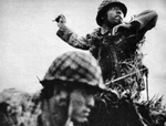 Japanese soldier throwing a Type 91 grenade, Guadalcanal, Solomon Islands, Sep 1942