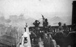Japanese Type 92 heavy machine gun crew atop a building in the Dadaocheng area of Taihoku (now Taipei), Taiwan during an air raid exercise, 1934