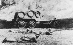 Japanese troops with a Sumida M.2593 (Army Type 91) armored car and a Type 96 machine gun, circa 1930s
