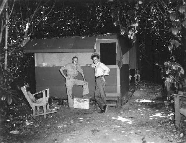 US Marine Corps Sergeant William Swisher and another Marine at a makeshift photography dark room, Guam, 1944