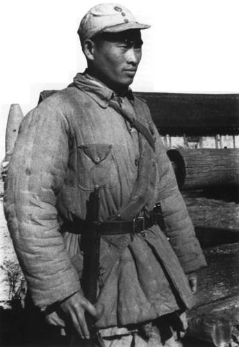 Communist Chinese guerilla fighter, China, date unknown