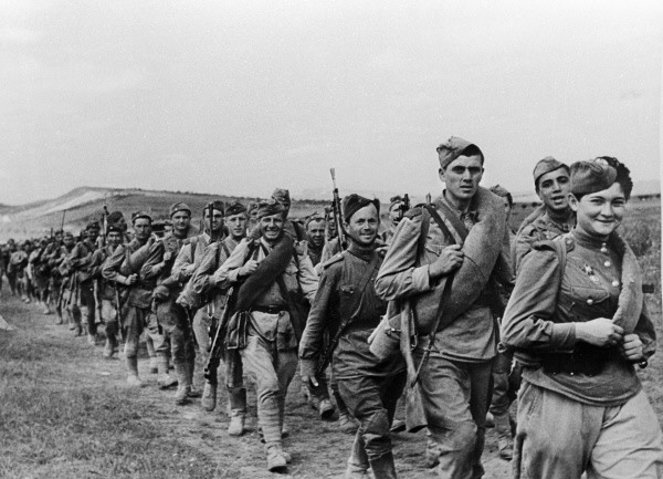 Soviet troops marching in the countryside, Russia, date unknown
