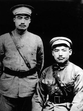 Portrait of Ma Buqing (seated) and Ma Bufang (standing) of the regional Ninghai Army in China, date unknown