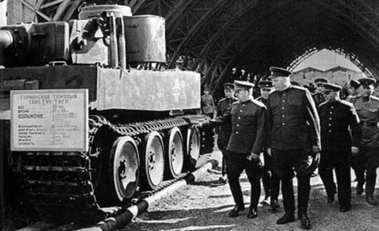 Marshal Georgi Zhukov, Colonel General Nikolay Voronov, and Marshal Kliment Voroshilov inspecting a captured German Tiger I heavy tank, Ukraine, 1943