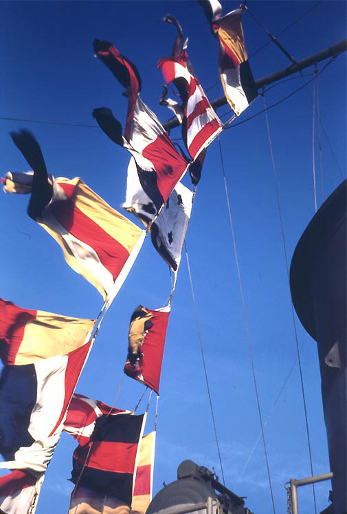 Signal flags flying from Sanborn's halliards, circa late 1944 or in 1945, photo 1 of 2