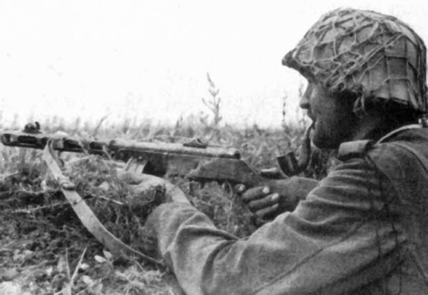 German soldier with a captured PPSh-41 submachine gun, circa 1940s