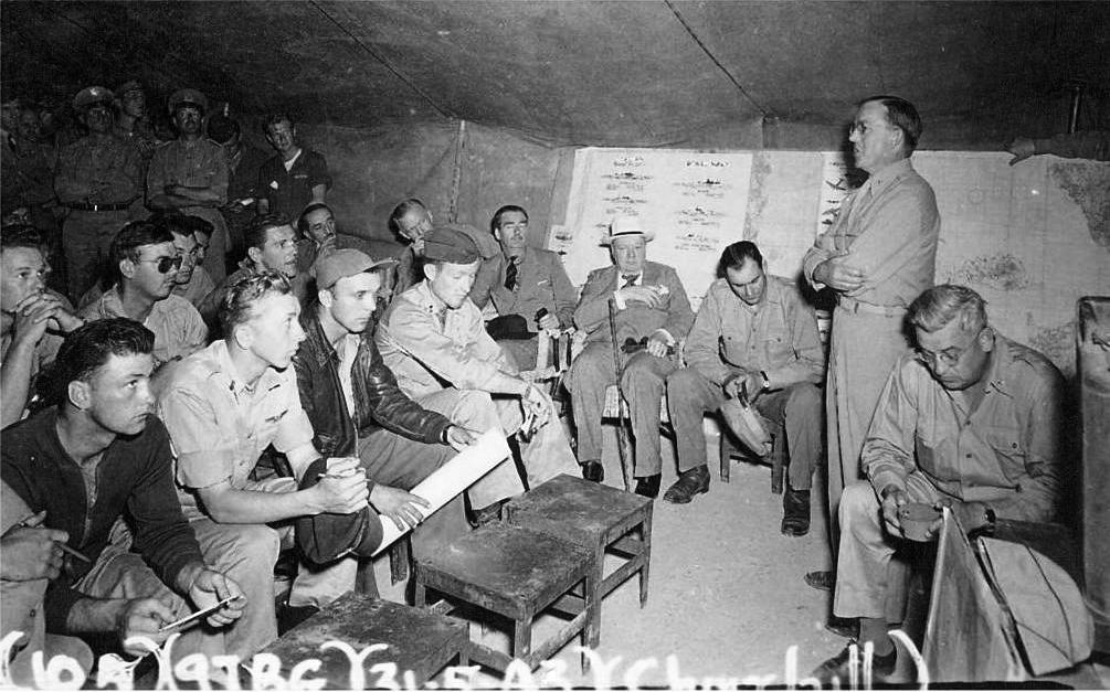 Inspecting North African bases, Winston Churchill attends a USAAF 414th Bombardment Squadron briefing at Chateau-dun-du-Rhumel Airfield, Algeria, 31 May 1943; note Brooke, Marshall, Eden