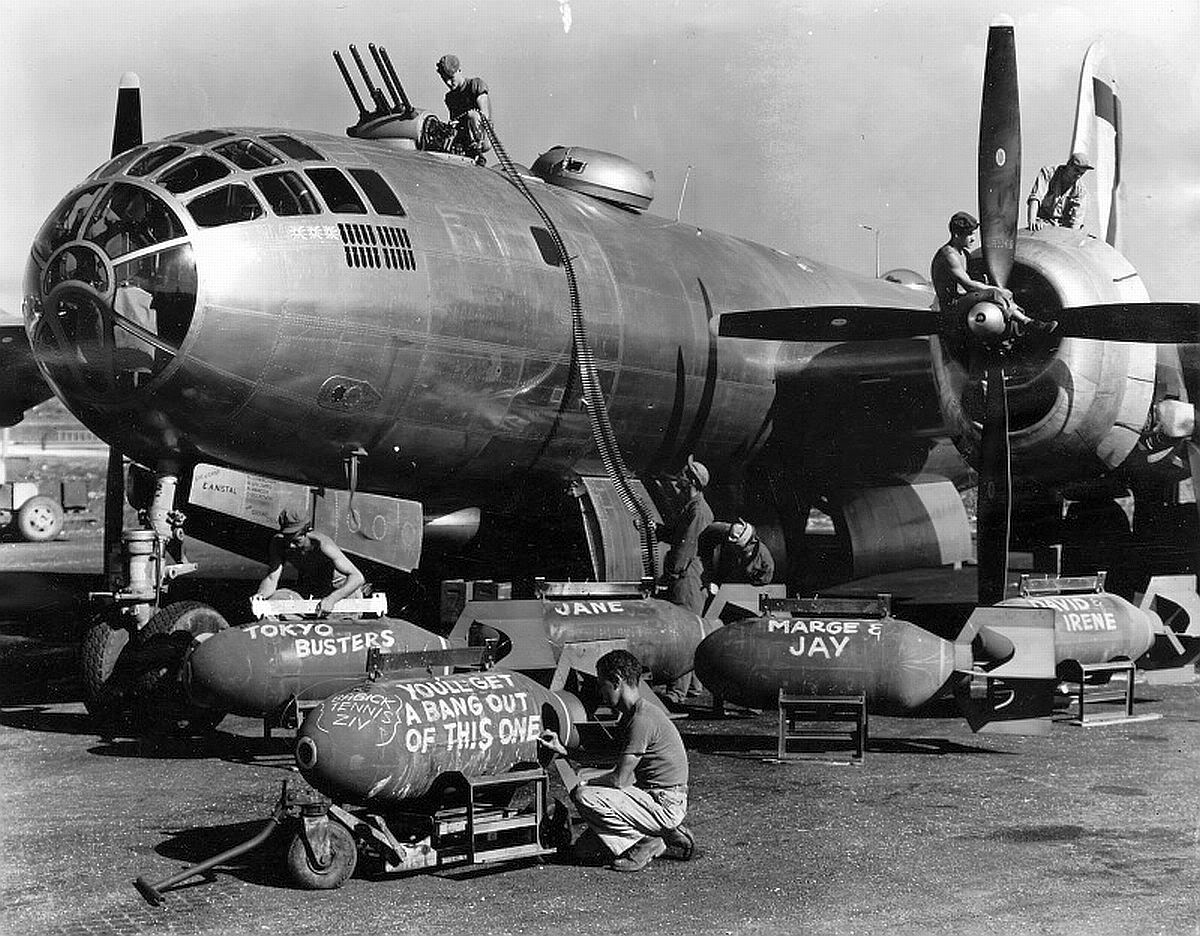 Ground crews arming a B-29 Superfortress of the 500th Bomb Group at Isley Field, Saipan, Mariana Islands, 1944-45.