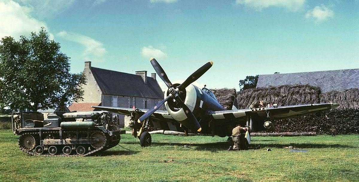 Razorback P-47 of the 355th Fighter Group at rest at Steeple Morden, Cambridgeshire, England, UK, 1943-44. Note Cletrac M-2 High Speed Tractor.