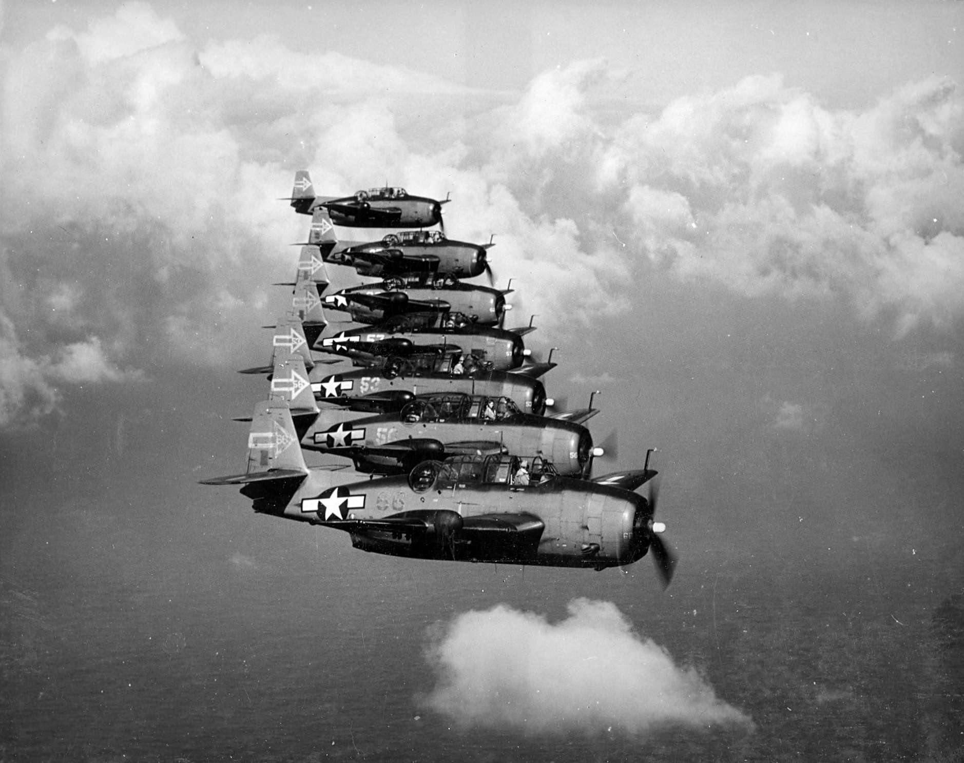 Seven TBM-3D Avengers modified for night action of VT(N)-90 flying from the carrier Enterprise, Jan 1945 Western Pacific. Photo 1 of 2