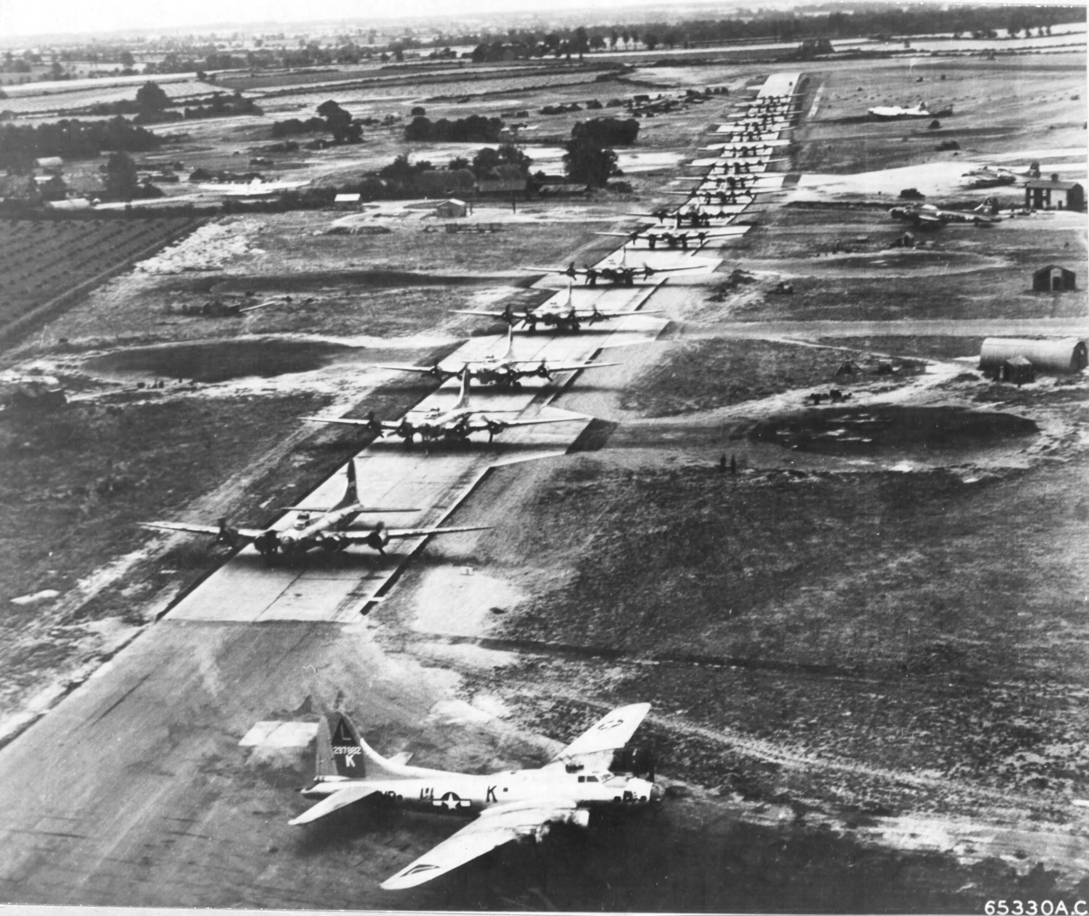17 B-17 Fortresses from the 533rd Bomb Squadron line up for a mission at Ridgewell, Essex, England, UK, 1945