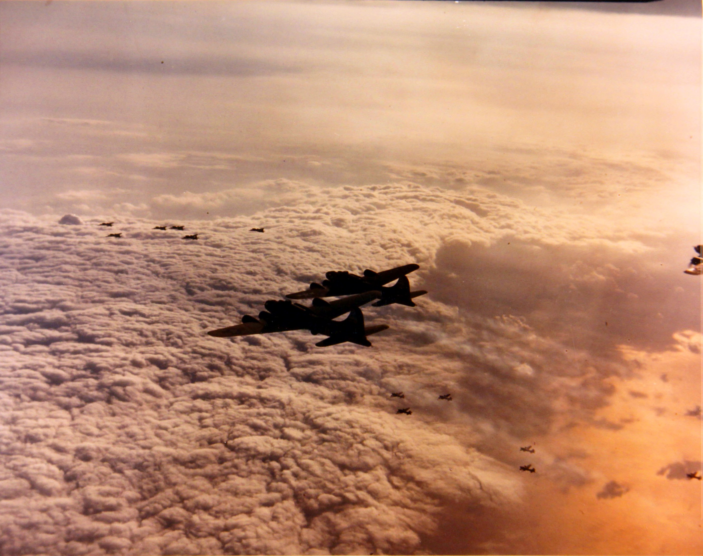 B-17 Fortresses of the 91st Bomb Group nearing the Dornier Assembly Plant at Meulan, France at dawn, 31 Aug 1943.