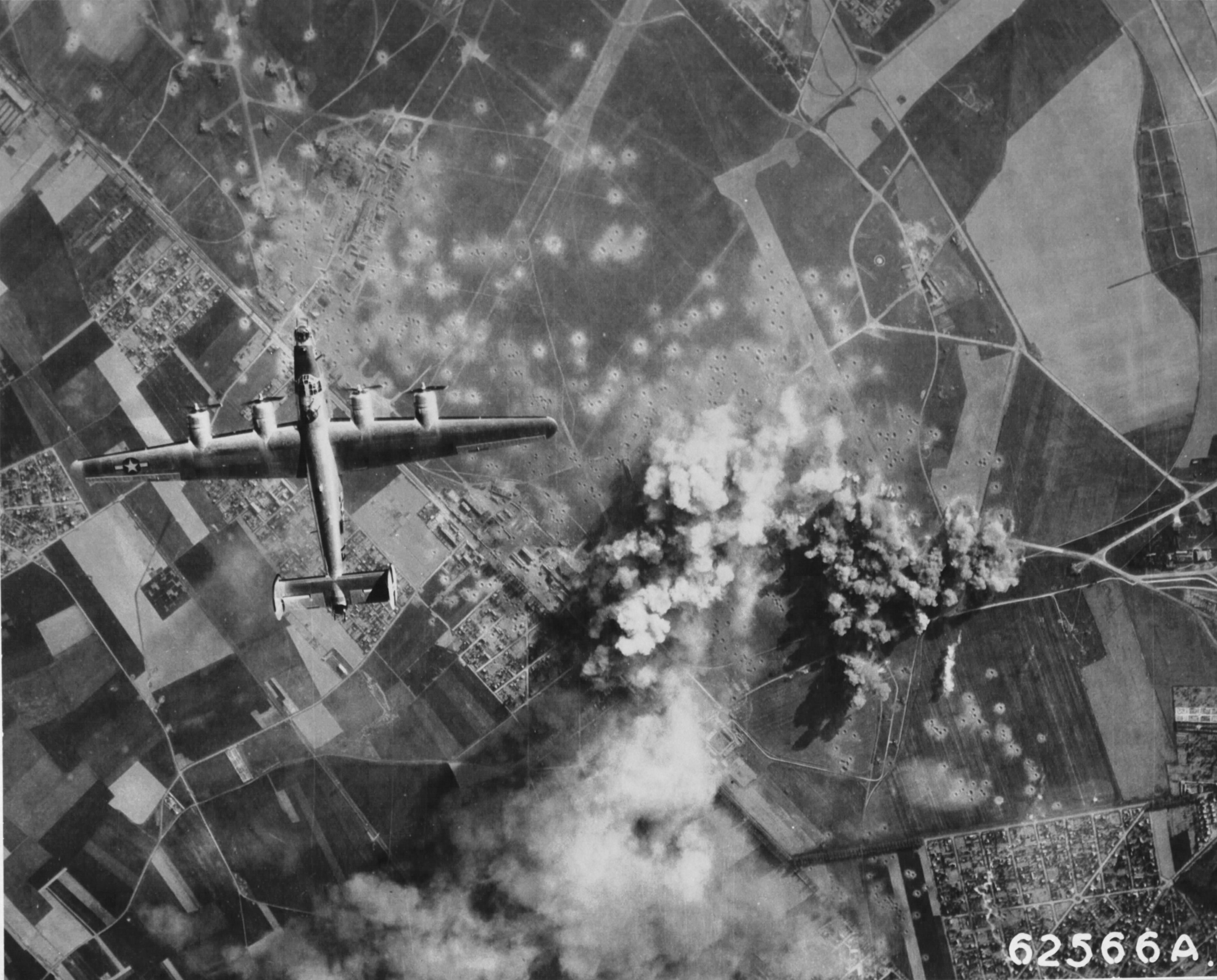 B-24 Liberator of the 705th Bomb Squadron over Orly Airfield, Paris, May 14 1944.