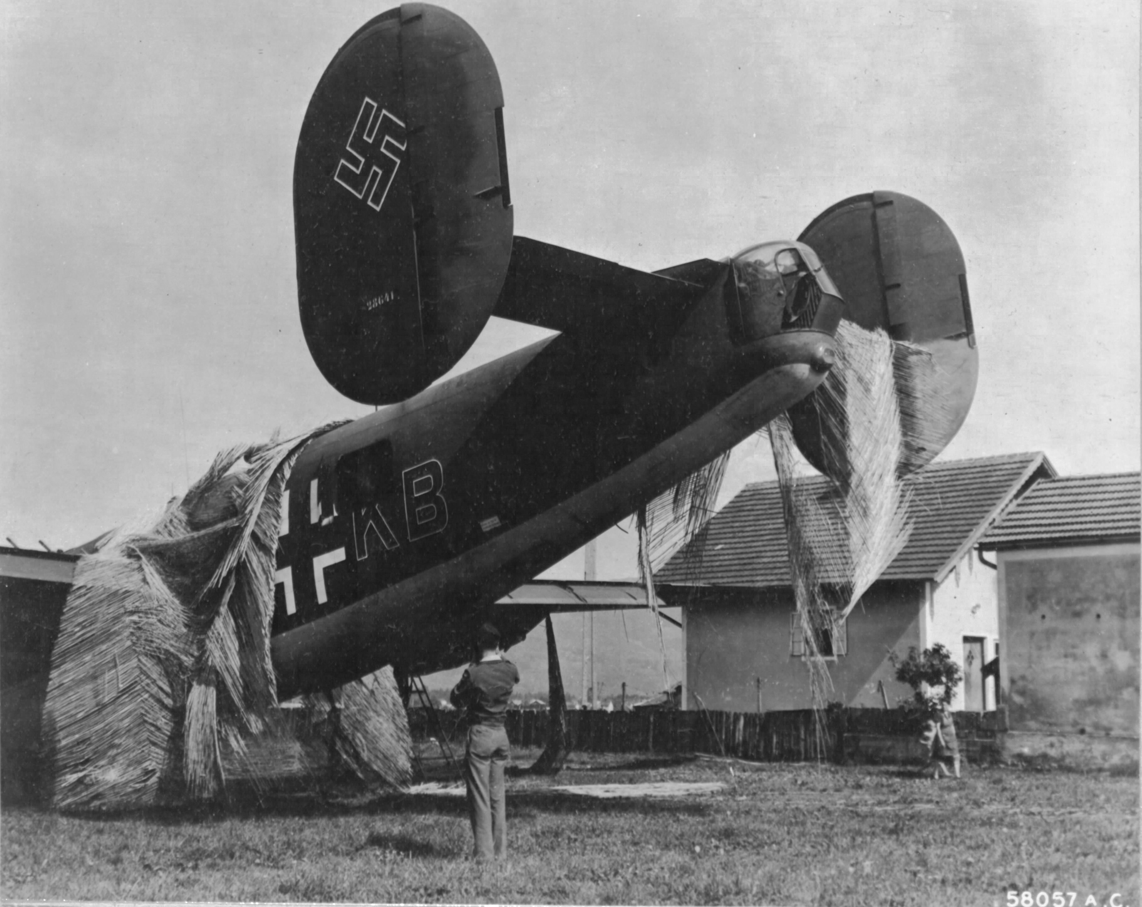 B-24H of the 732nd Bomb Squadron was force to land at a Luftwaffe airfield in France Feb 4 1944. It was repaired and flown by the Germans as A3+KB. It was then recaptured at Salzburg, Austria in May 1945 where it was examined here by SSgt JT Sipkovsky