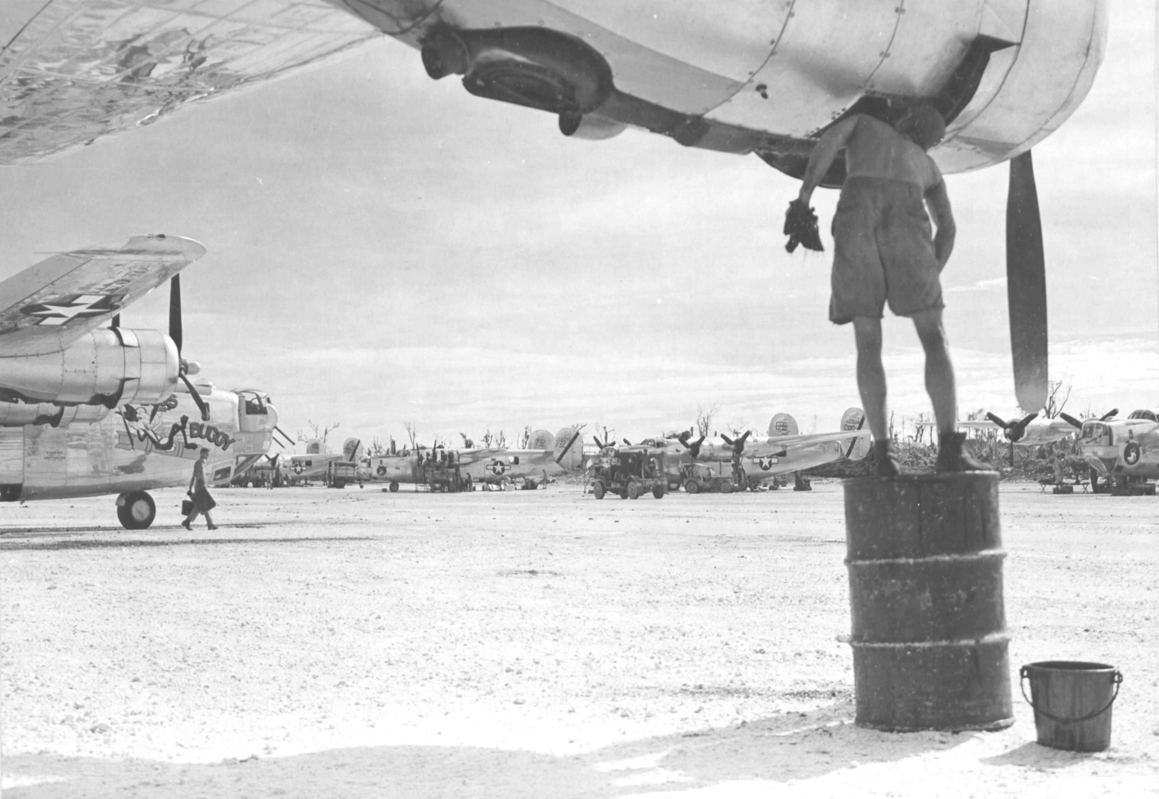 B-24J Liberators of the 494th Bomb Group receive maintenance on Angaur, Palau Islands, Dec 8 1944