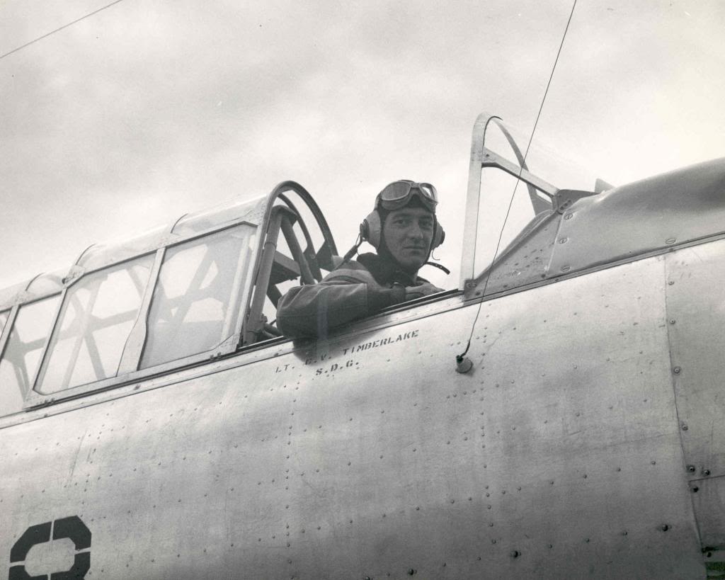 Navy Lt CV Timberlake, an LSO on the training aircraft carrier USS Sable sits in his SNJ Texan, Lake Michigan, United States, 1943-44.