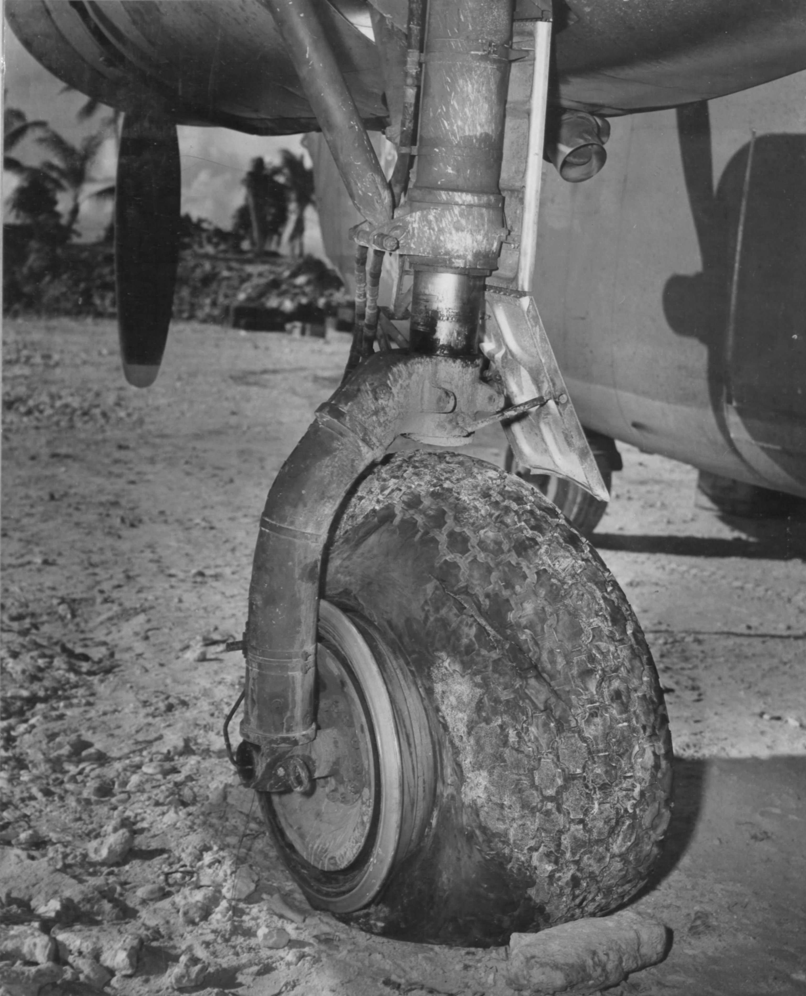 B-24D Liberator 'Superman' at Funafuti, Gilbert Islands, 20 Apr 1943, photo 4 of 4; note damage sustained in combat over Nauru